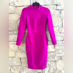 Fun and sophisticated dress! Size small. Very nice detailing.